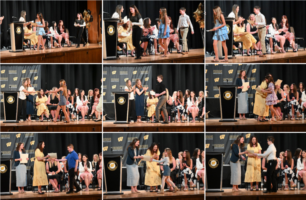 students receiving awards on stage